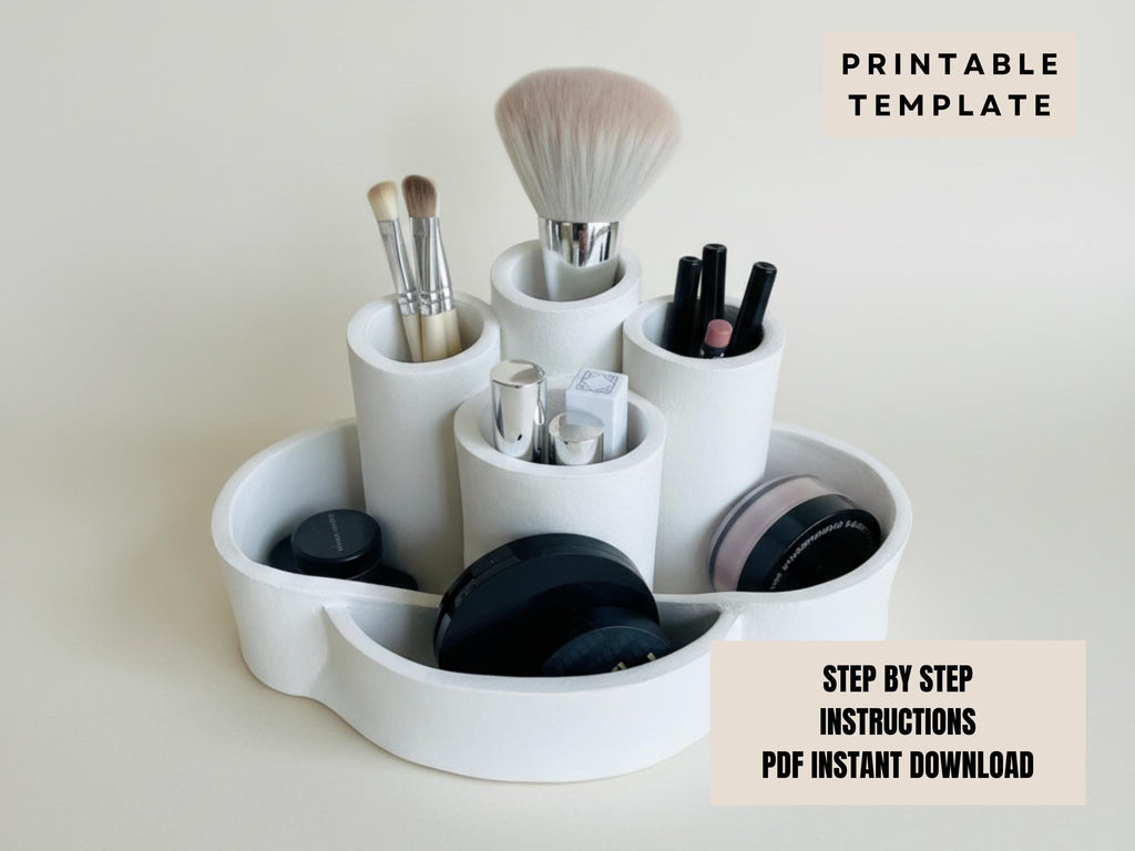 A white makeup organizer with various makeup brushes and containers, including a large brush and multiple smaller ones, arranged in a circular pattern.
