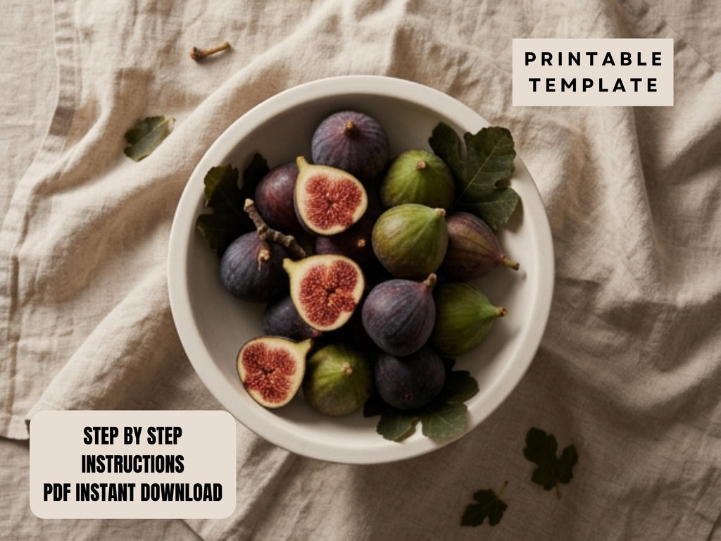 A bowl filled with sliced figs and leaves, placed on a beige cloth.