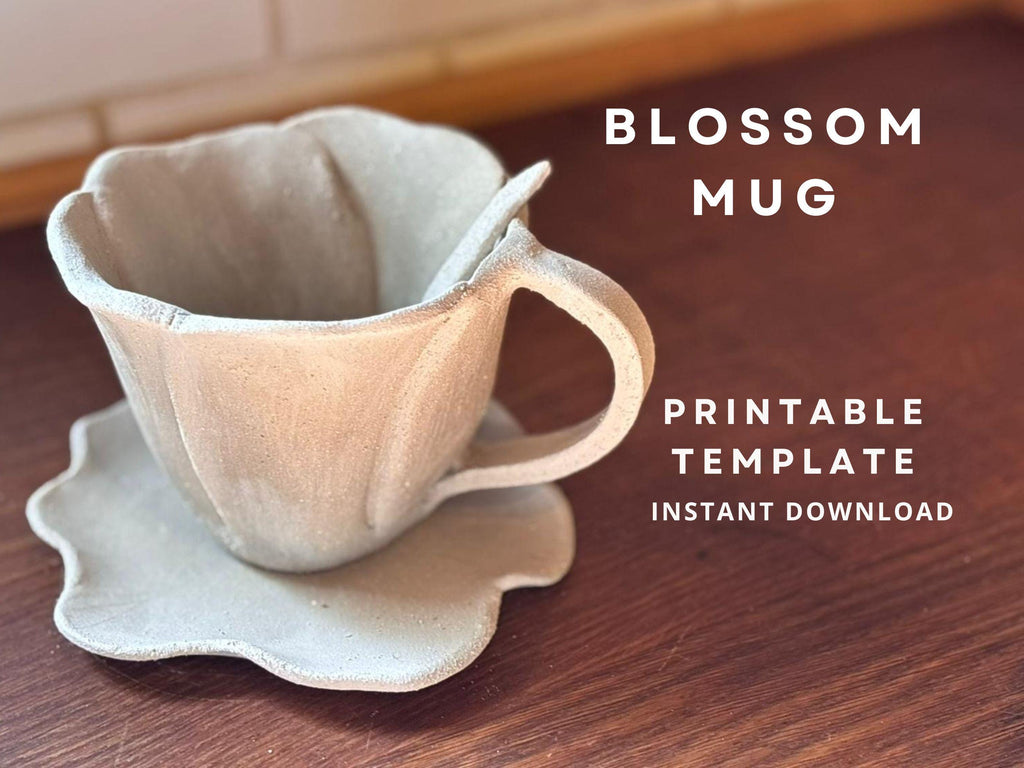 Handmade ceramic mug shaped like a flower blossom, with a matching wavy-edged saucer and small spoon. The mug has a textured surface and a natural clay finish, displayed on a wooden countertop. Text overlay reads "Blossom Mug – Step by Step Instructions, PDF Instant Download.