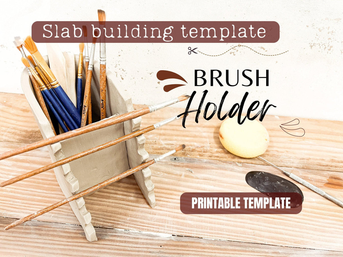 a set of paintbrushes in a wooden holder, along with a brush and a piece of paper, suggesting a painting or art-related activity.