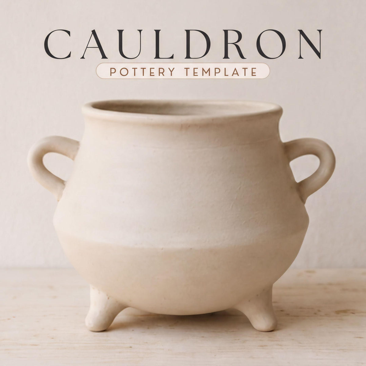 a white ceramic pot with handles, sitting on a wooden surface against a plain background.
