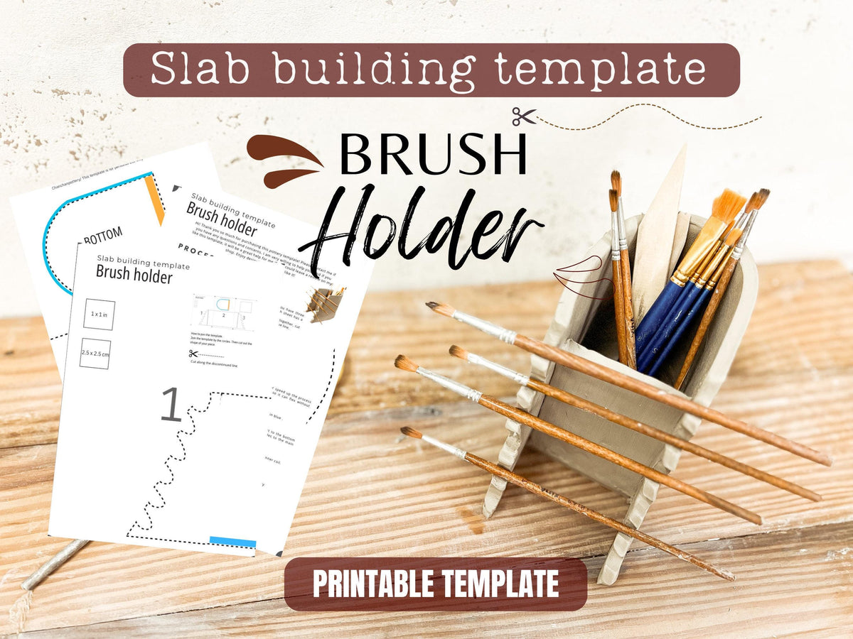 a slab building template for a brush holder, along with a set of paintbrushes and a wooden surface.