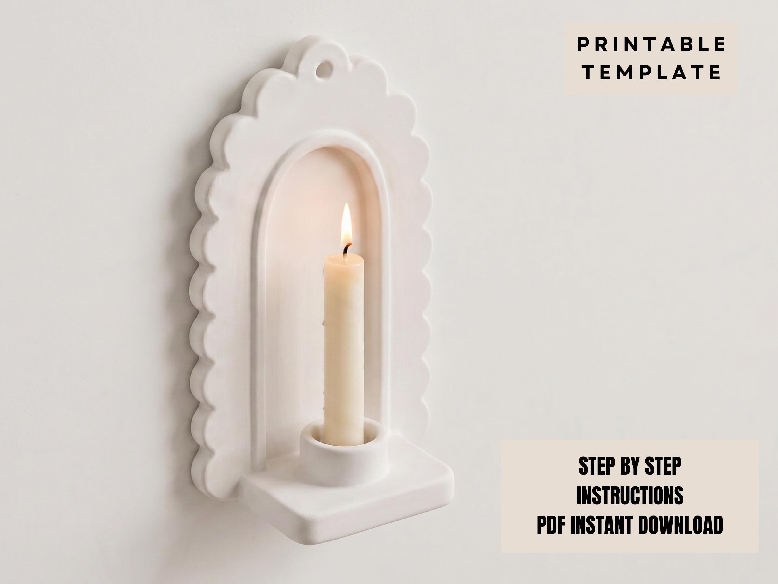 a white candle holder with a lit candle inside, mounted on a wall.