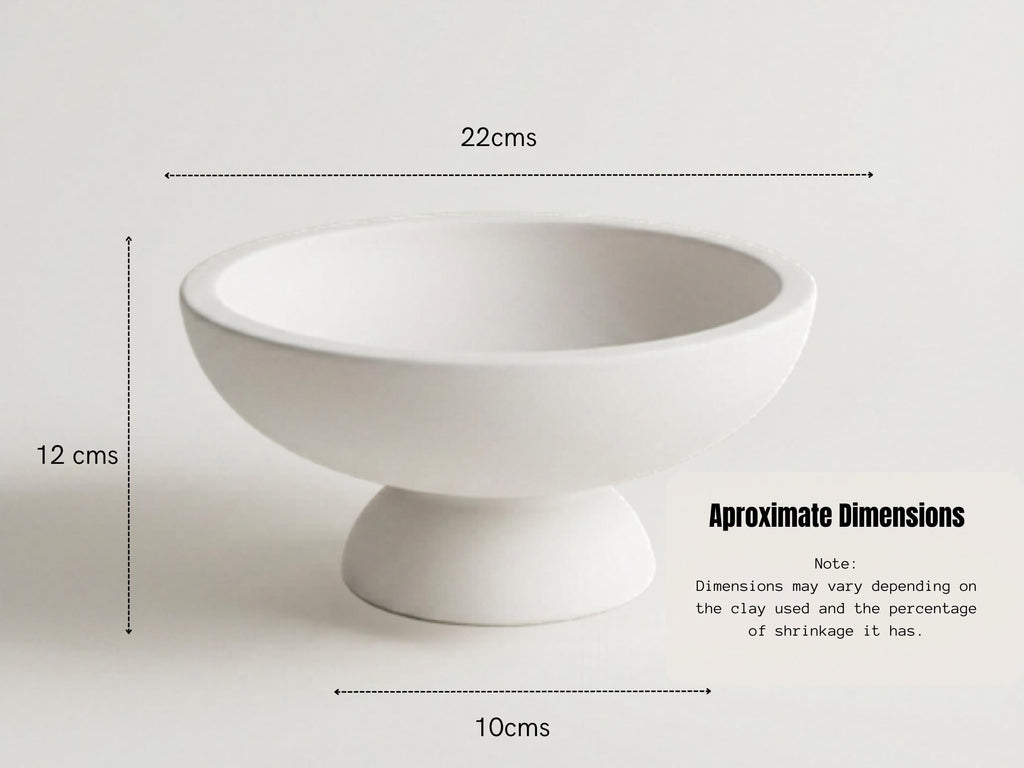 a white ceramic bowl with measurements and text indicating the dimensions of the bowl.