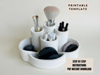A white makeup brush holder with various makeup brushes and containers inside, along with a text overlay that reads "PRINTABLE TEMPLATE" and "STEP BY STEP INSTRUCTIONS PDF INSTANT DOWNLOAD".
