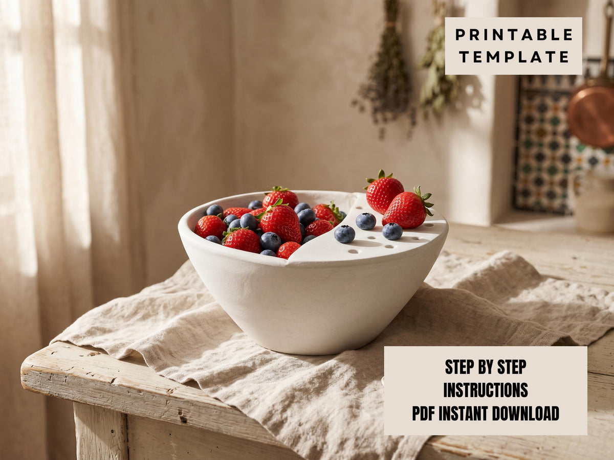 a white bowl filled with fresh strawberries and blueberries, placed on a wooden table.