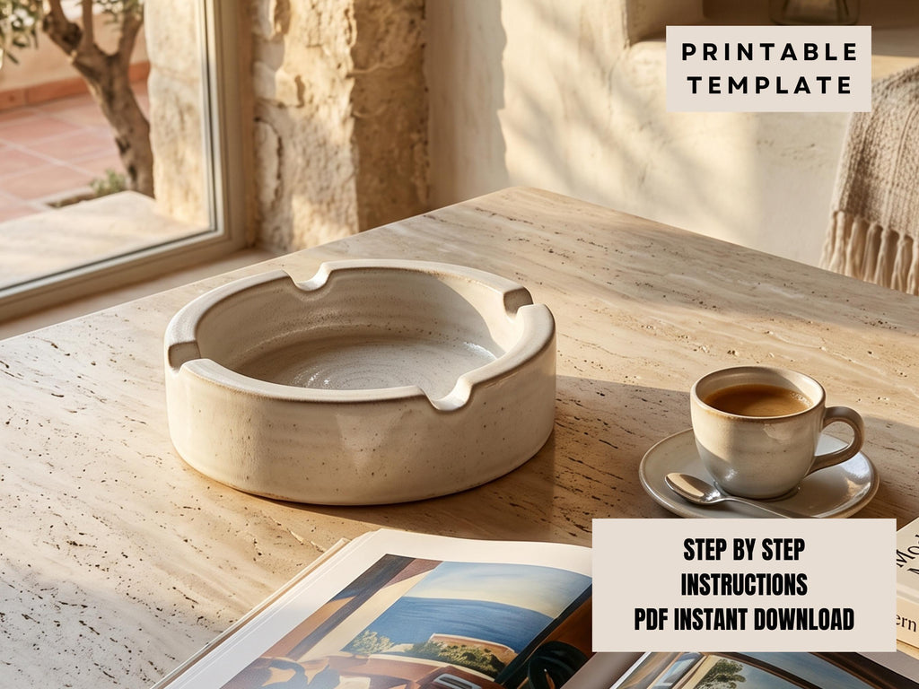 a white ceramic ashtray on a wooden table, with a cup of coffee and a magazine nearby.