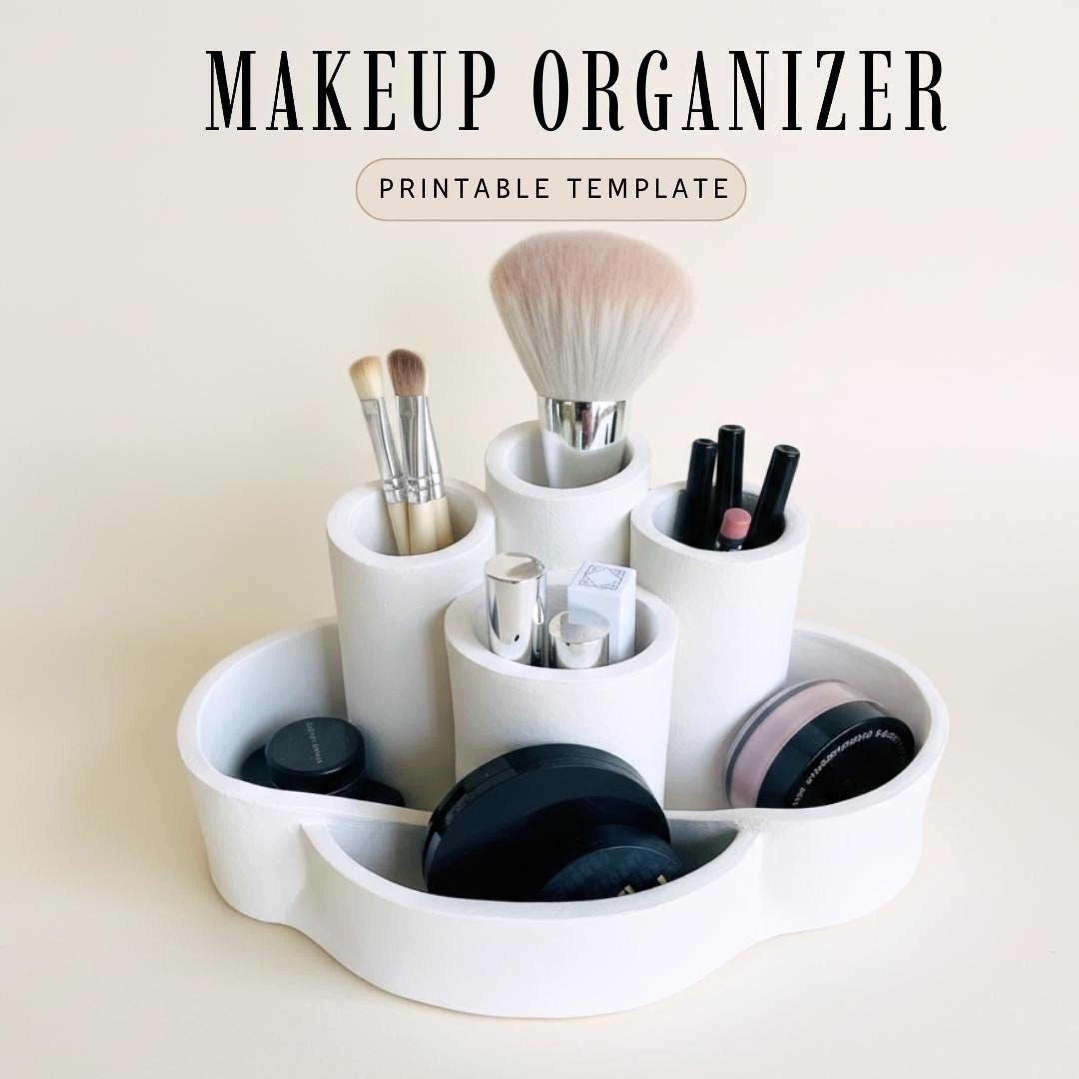 a makeup organizer with various makeup brushes and containers, including a makeup brush, a makeup brush, and a makeup brush, all placed in a white, round, and white-colored container.
