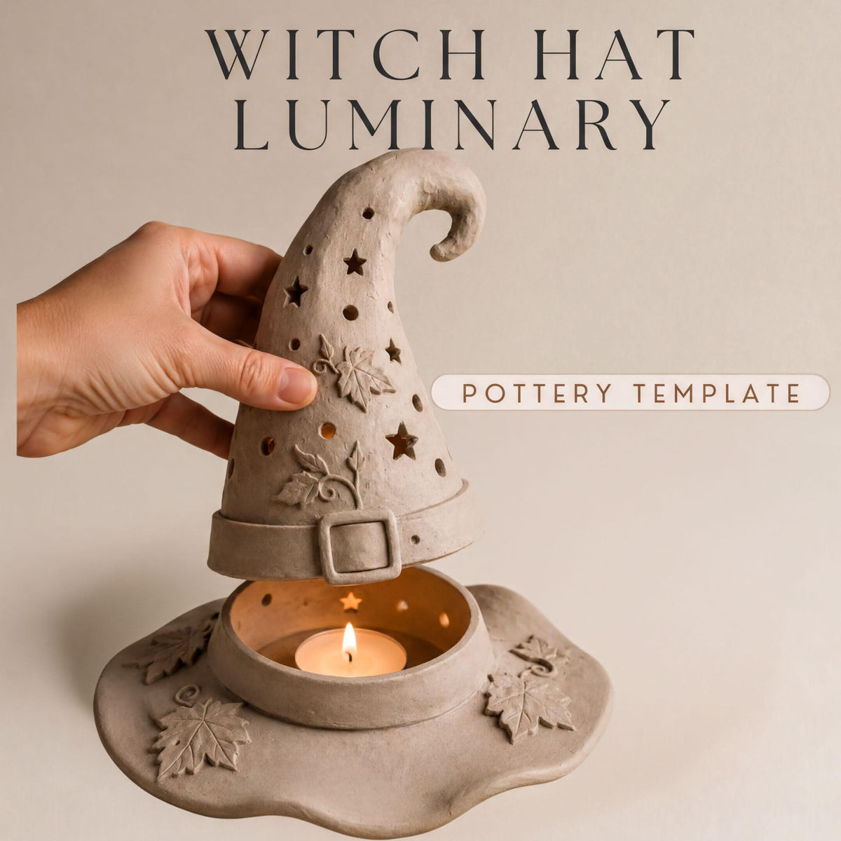 A hand is holding a witch hat-shaped candle holder with a lit candle inside, against a plain background.
