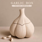 A ceramic garlic bulb-shaped container with a lid, sitting on a surface with some garlic cloves around it.