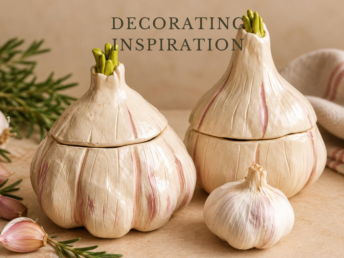three decorative ceramic garlic bulbs with green shoots growing out of them, placed on a beige surface.