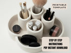 A white makeup organizer with various makeup brushes and containers, along with a text overlay that provides a printable template for creating a similar organizer.