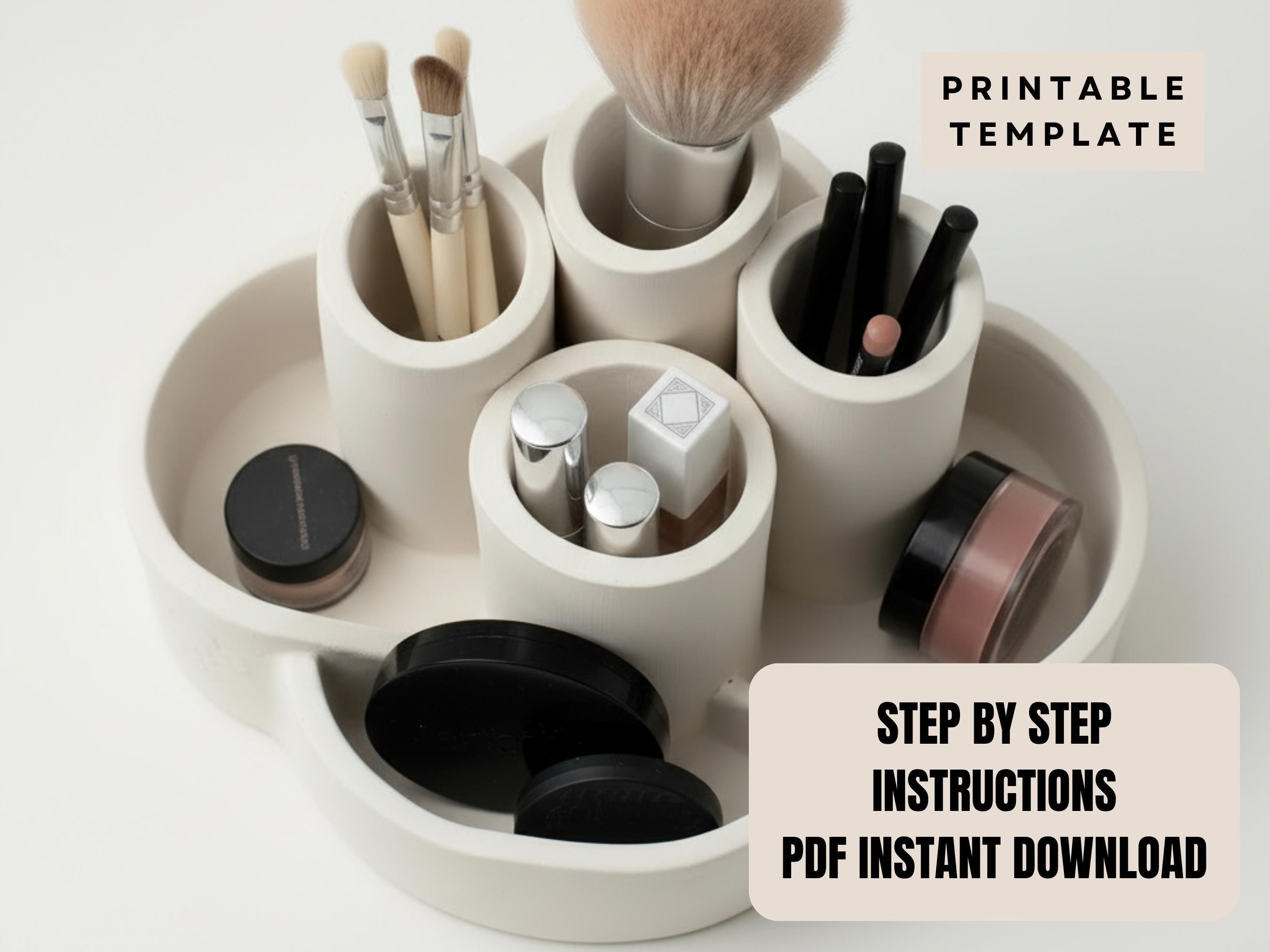 A white makeup organizer with various makeup brushes and containers, along with a text overlay that provides a printable template for creating a similar organizer.
