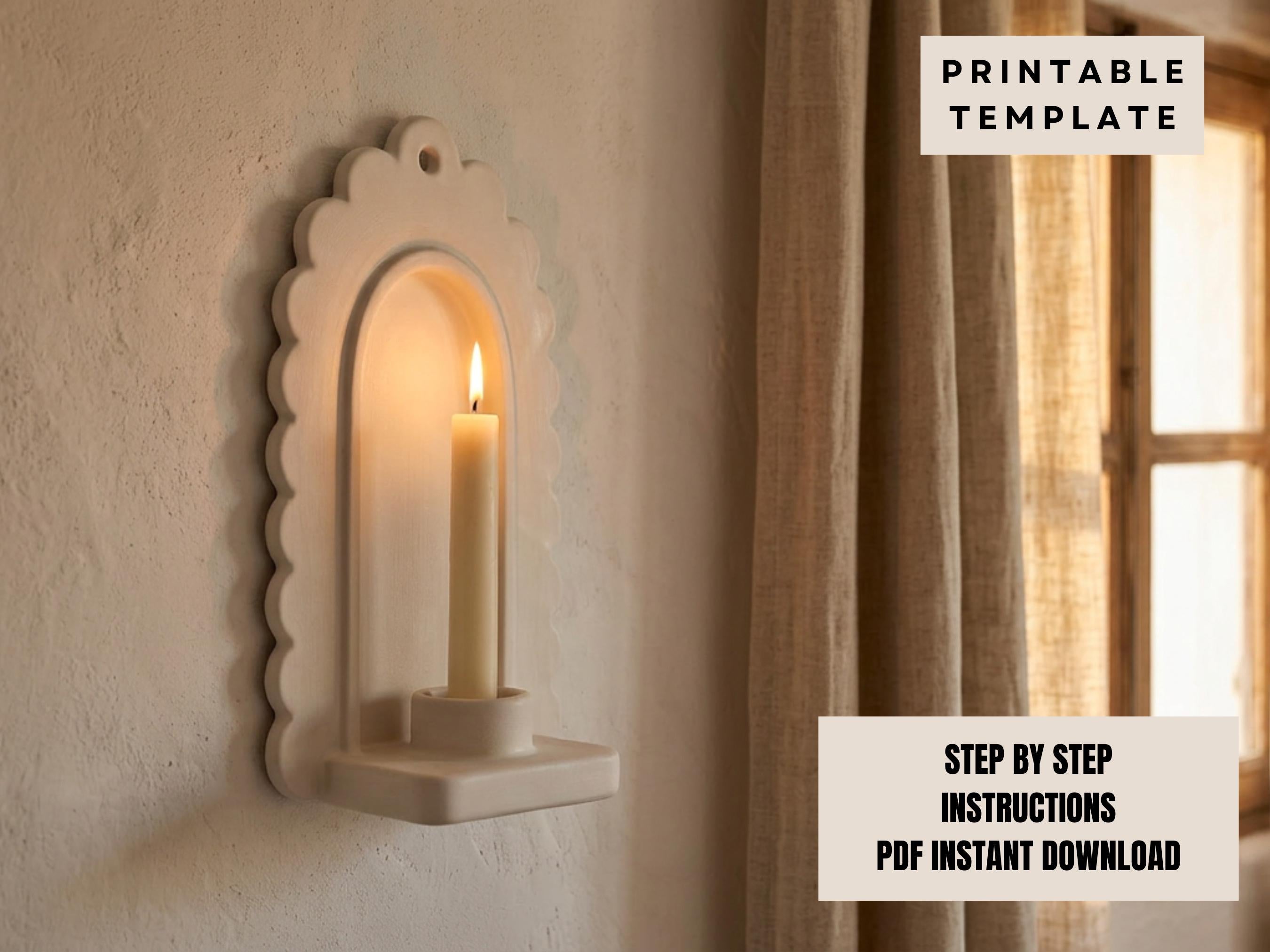 a white candle holder mounted on a wall, with a lit candle inside.