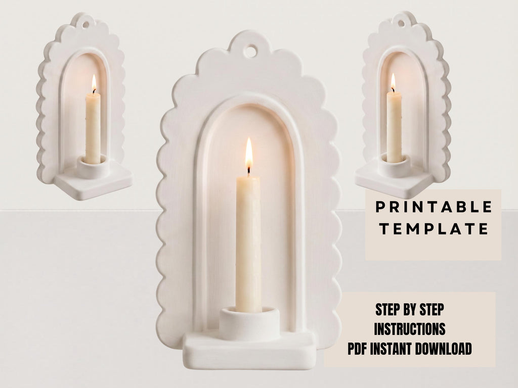 a white candle holder with a lit candle inside, set against a plain white background.