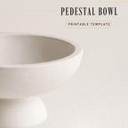 a pedestal bowl, which is a type of bowl with a raised platform or base.