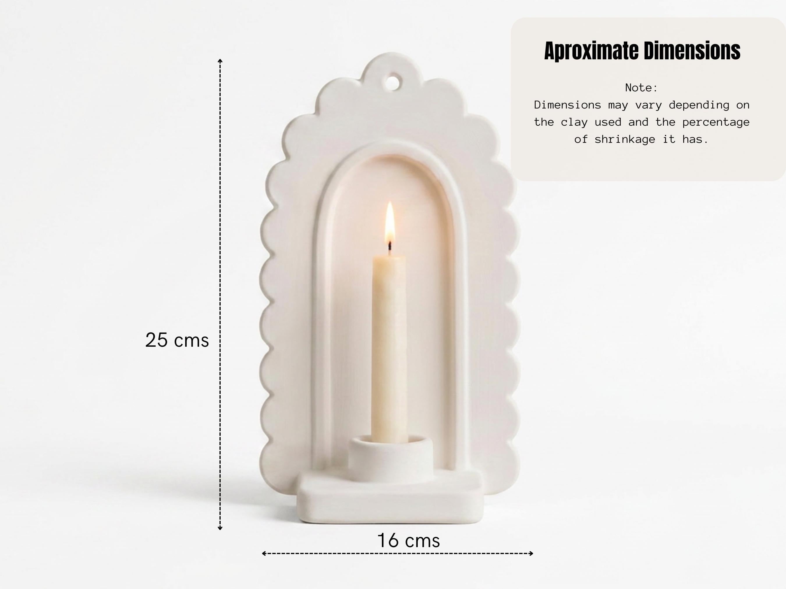 A white ceramic candle holder with a lit candle inside, along with dimensions provided in centimeters.